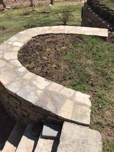 Retaining wall and cut granite steps