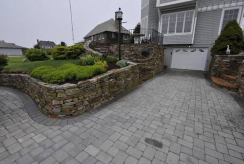 Quarry Stone Retaining Walls and Steps with Brick Top