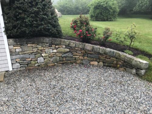 Fieldstone Retaining Wall with Cut Granite Cap