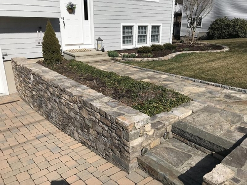 Fieldstone planter, walkway and steps