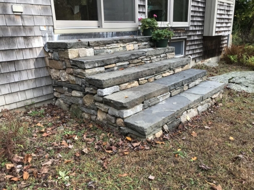 Fieldstone steps capped with antique bluestone