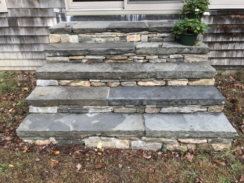 Fieldstone steps capped with antique bluestone