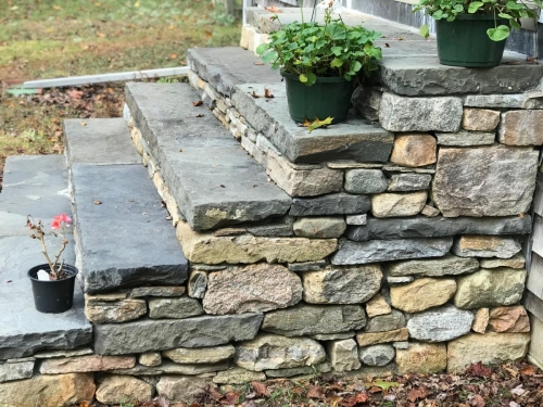 Fieldstone steps capped with antique bluestone