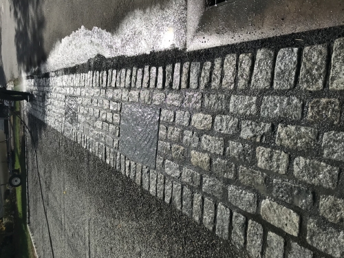 Cobblestone driveway apron laid in cement