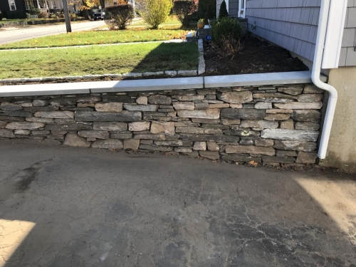 fieldstone and bluestone retaining wall
