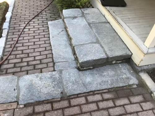 Brick walkway with rebuilt cut granite steps