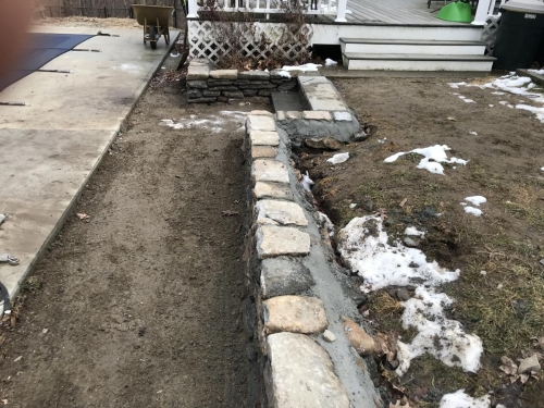 Fieldstone retaining walls and steps