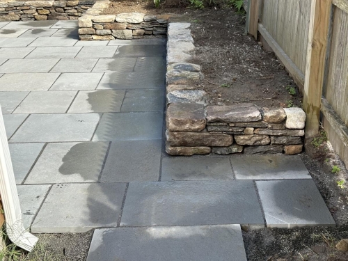 #bluestone #patio and #walkway with a #fieldstone #retainingwall