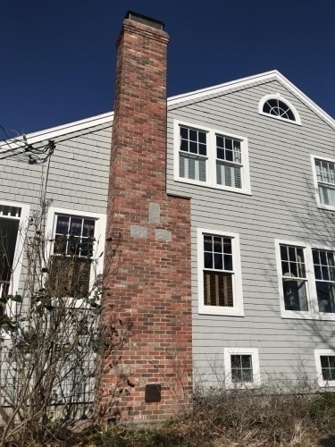 Restored brick chimney