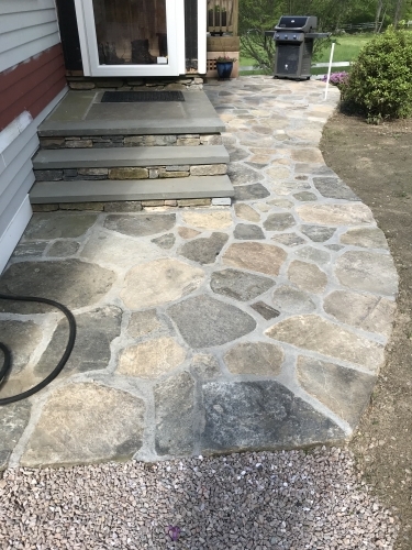 Fieldstone walkway with granite top