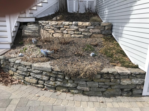Retaining wall and planter