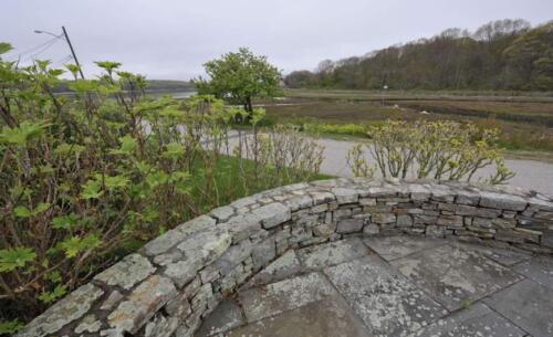 Bluestone Patio With Fieldstone Walls