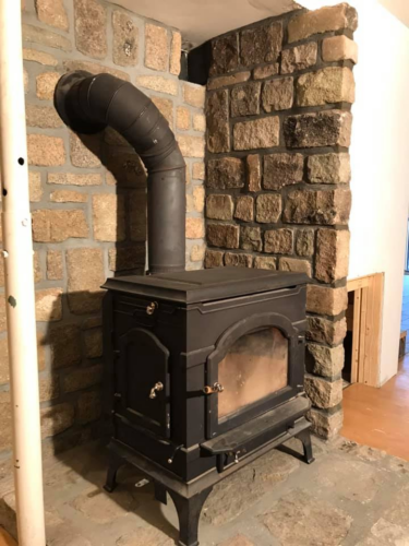 Antique Cobblestone And Hearth Wood Stove Surround