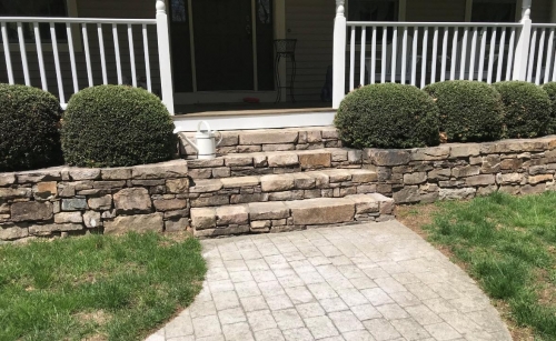 Cut granite retaining wall, quarry stone steps and planter. Old granite steps. Groton