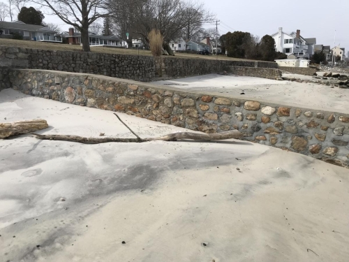rebuilt stone wall after a hurricane